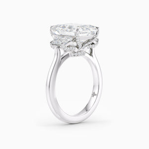 Emerald-Cut and Trapezoid Three-Stone Engagement Ring